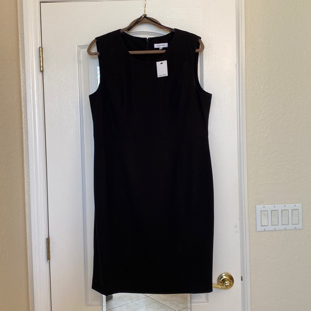 NWT Calvin Klein Sleeveless black sheath dress. Lined. Size 16 back slit.